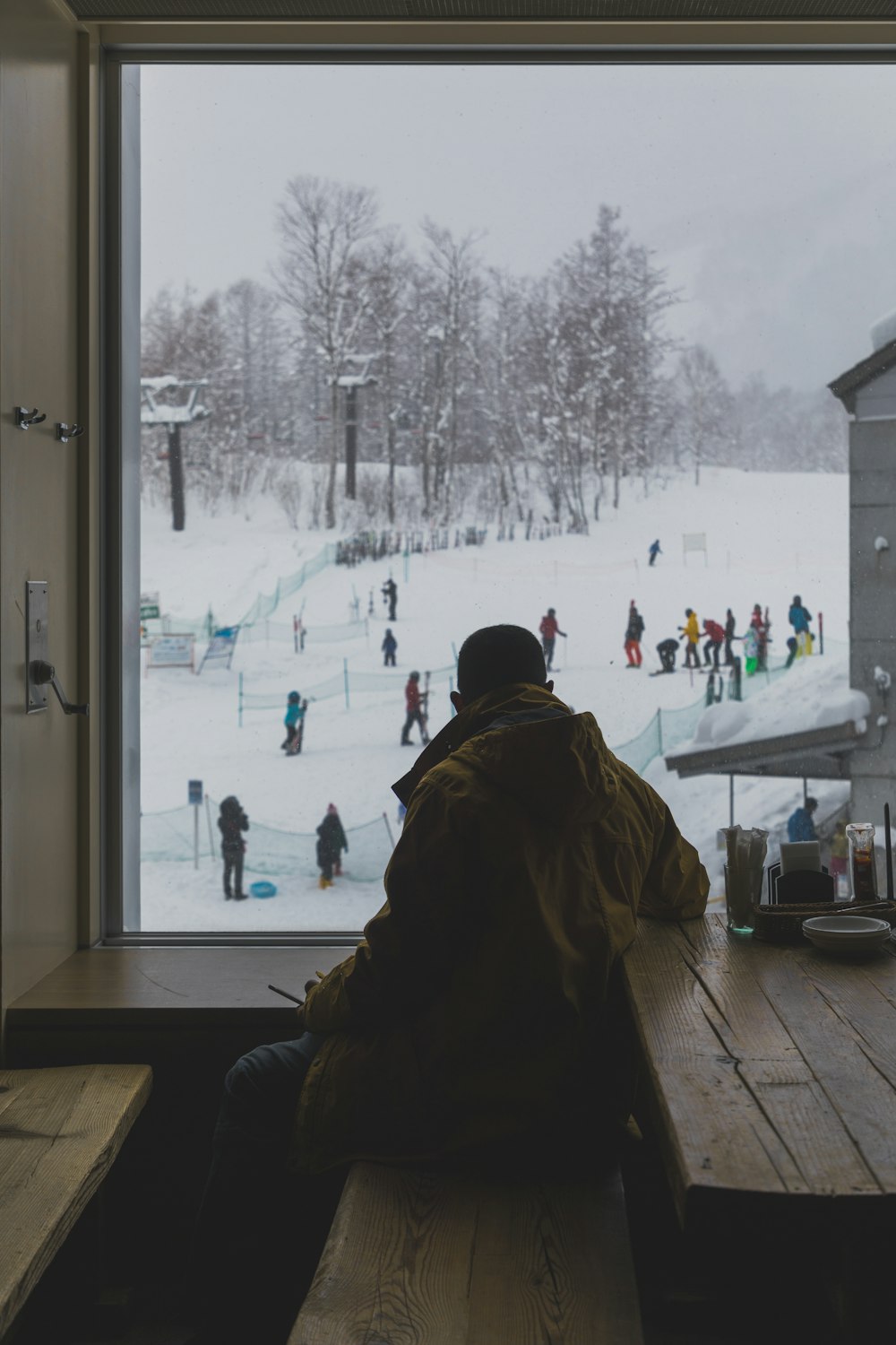 people walking on snow covered ground during daytime