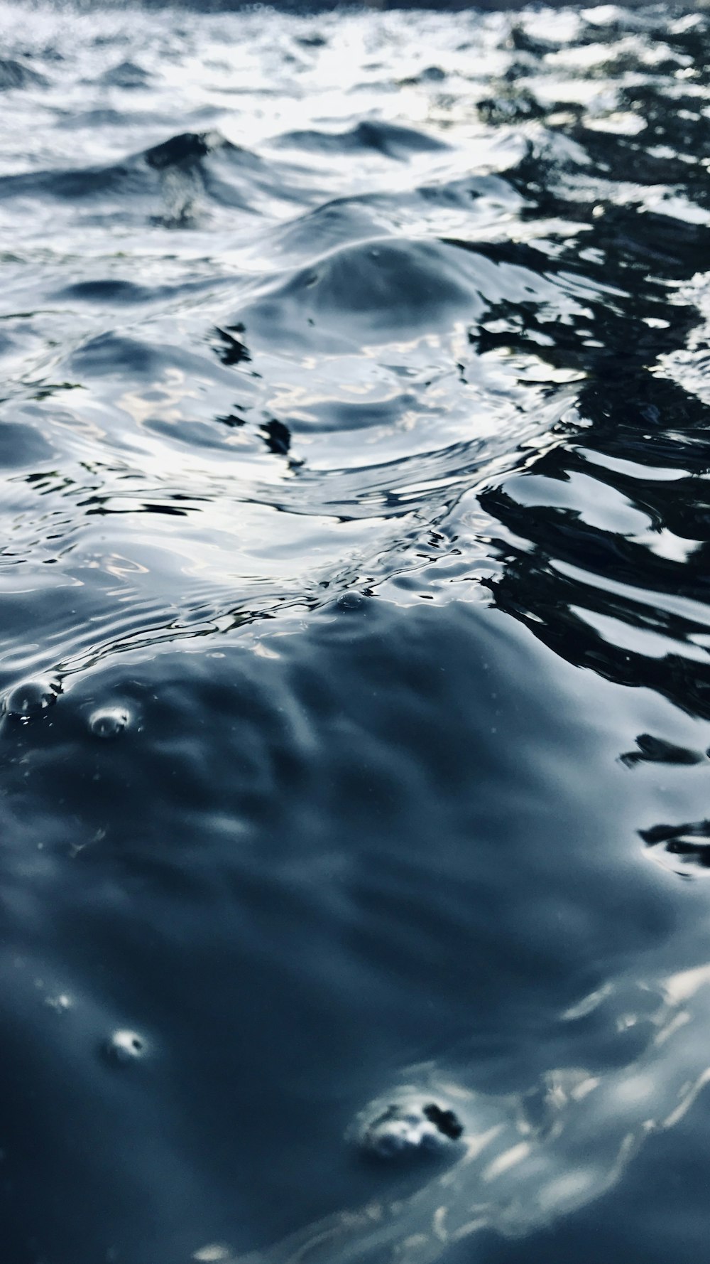 water drops on body of water