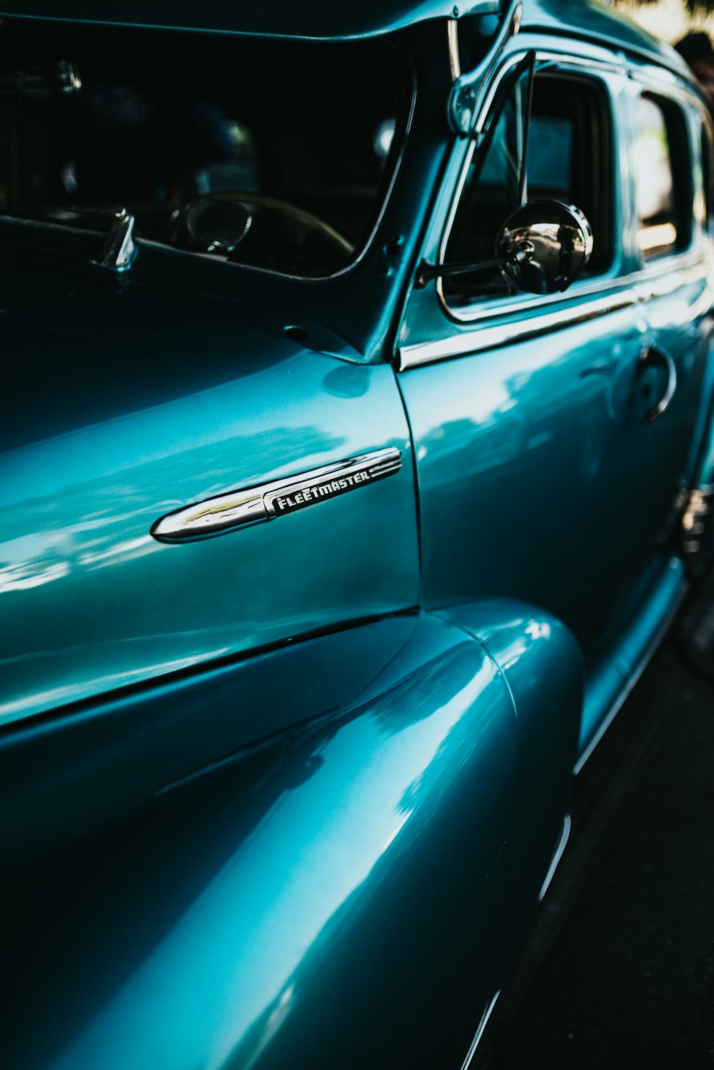 blue car with white license plate