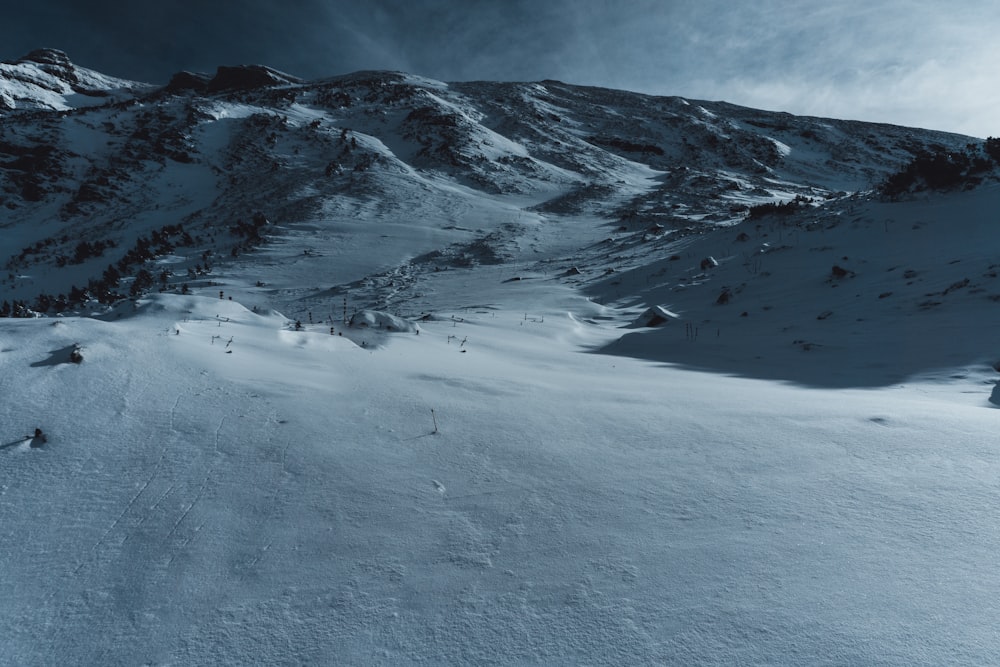 snow covered mountain during daytime