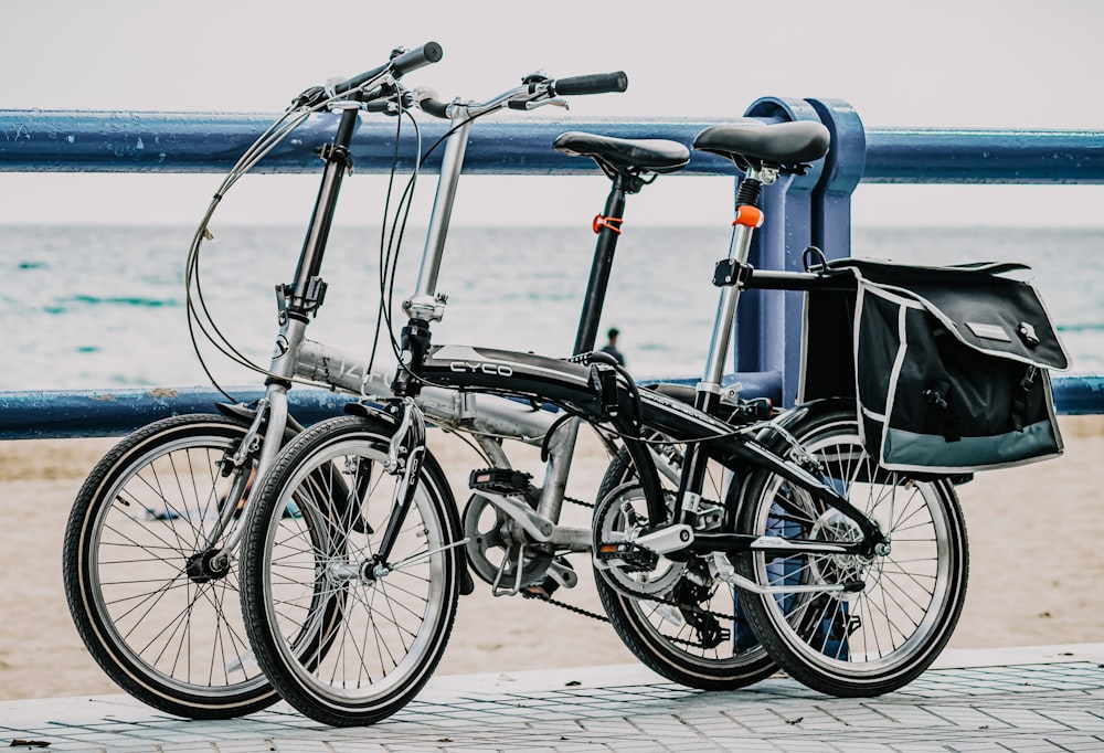 black city bike on beach during daytime