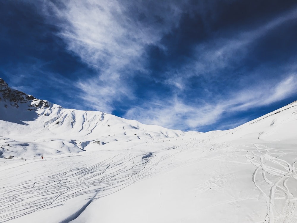 snow covered mountain under blue sky during daytime