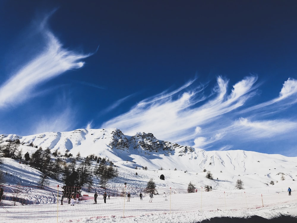 snow covered mountain under blue sky during daytime