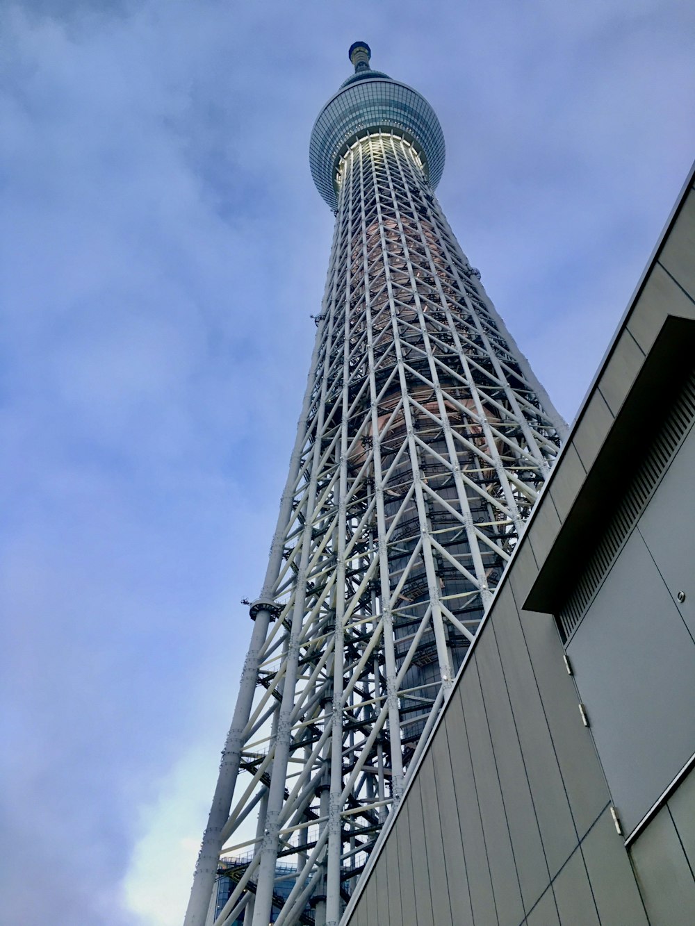 gray and black tower under blue sky