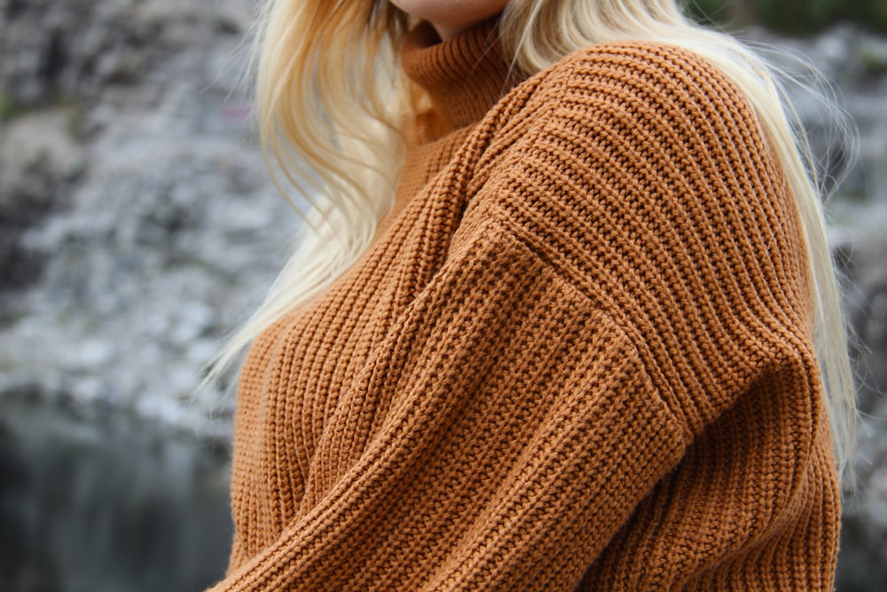 woman in brown knit sweater