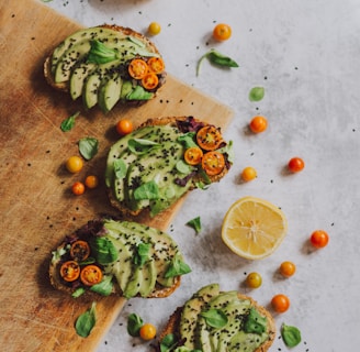 avocado toast on brown wooden chopping board