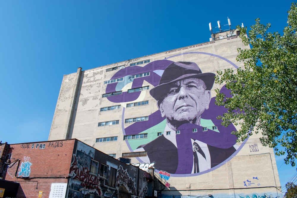 mans face graffiti on wall