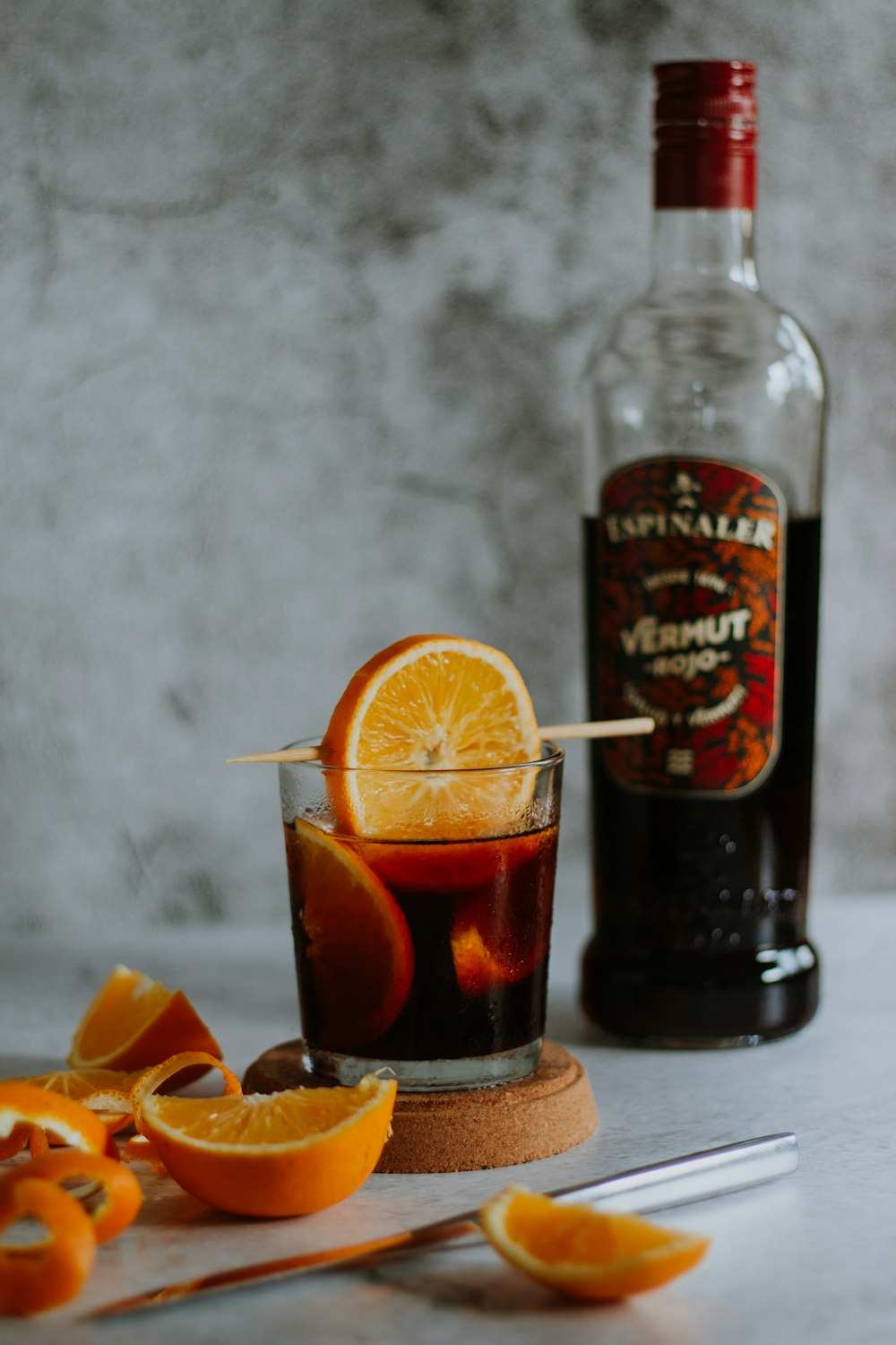 orange juice on black glass bottle