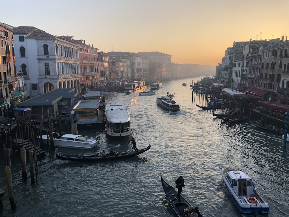 boat on water near buildings during daytime