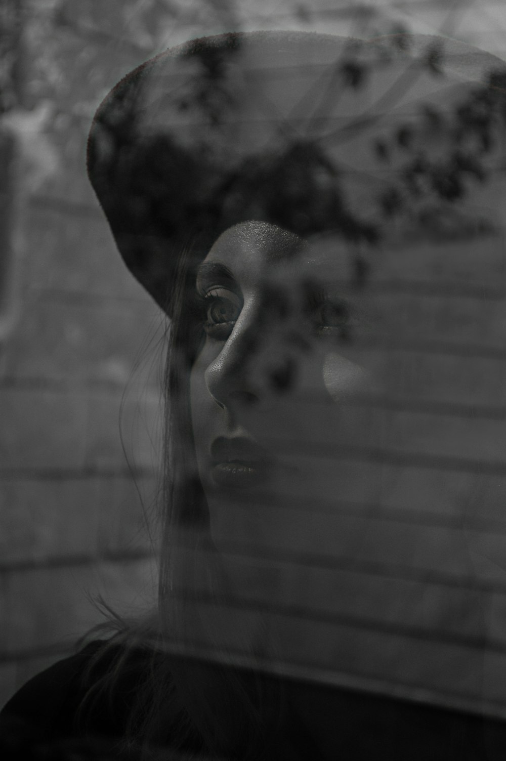 womans face in grayscale photography