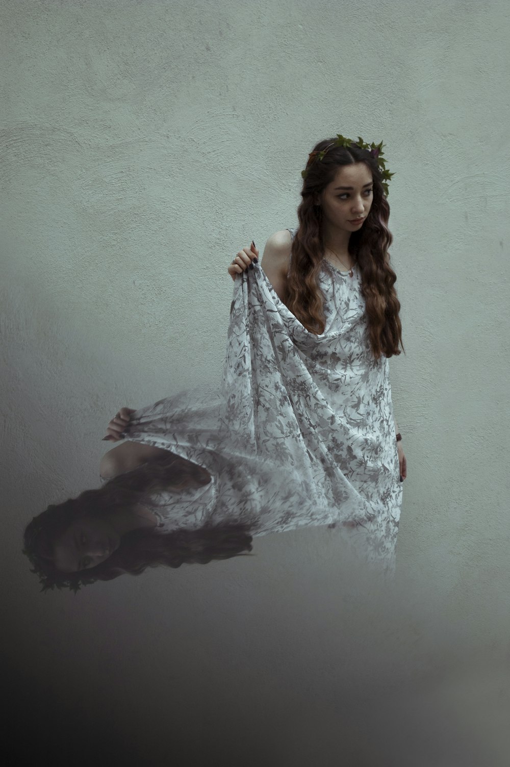 woman in white and black floral dress