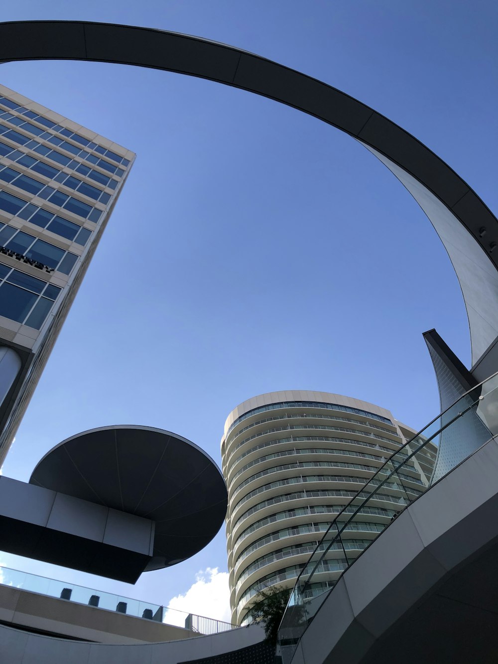 white and black concrete building under blue sky during daytime