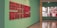 A gallery hallway featuring an art installation on the left with red-framed objects displayed on a teal wall. The installation consists of several red panels with numerous small, vintage-looking items attached, possibly technological or industrial components. On the right, a large digital screen displays an image of machinery with metallic and red elements visible.