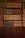 brown wooden book shelf with books