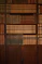 brown wooden book shelf with books