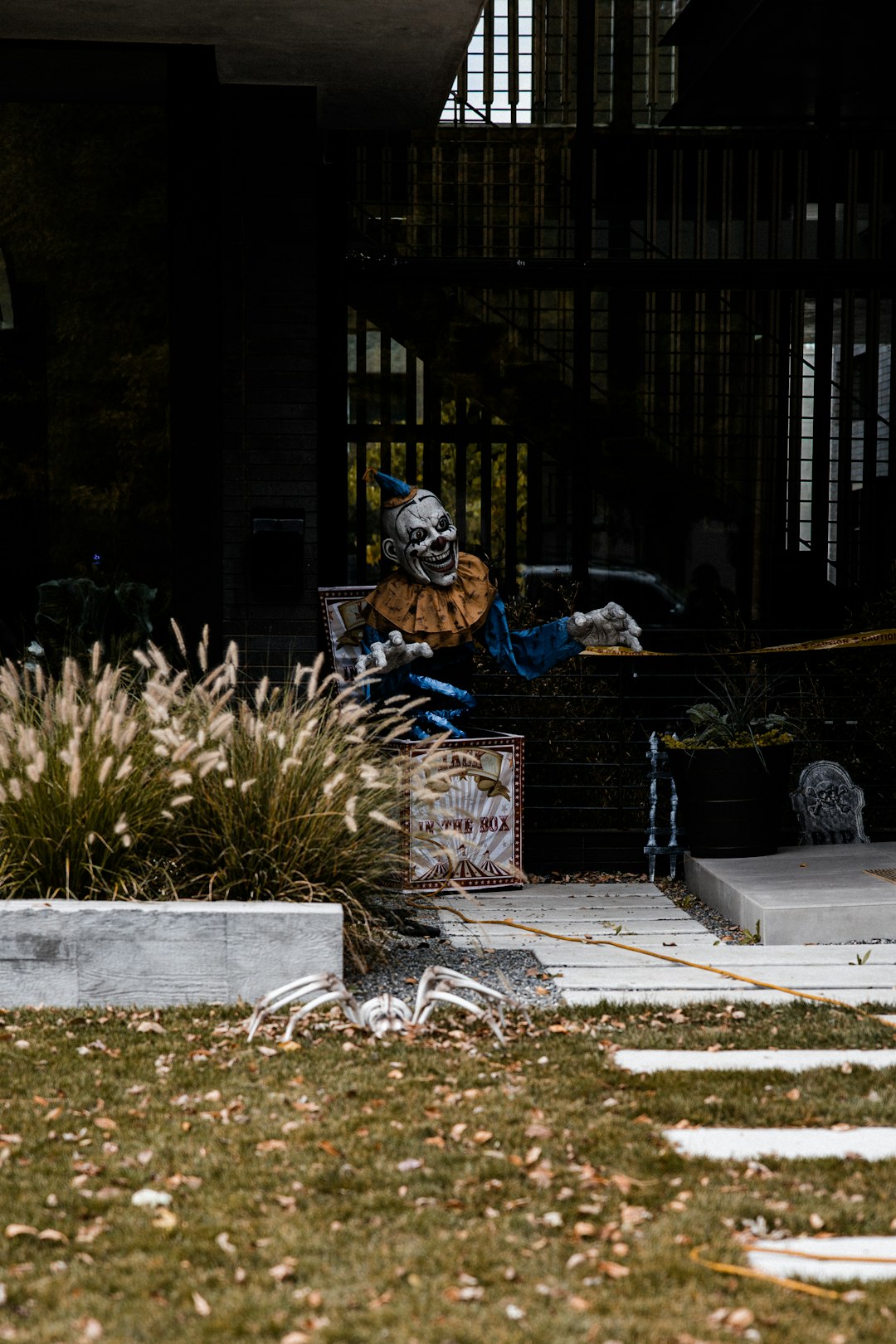 person in blue and white jacket sitting on black bench during daytime