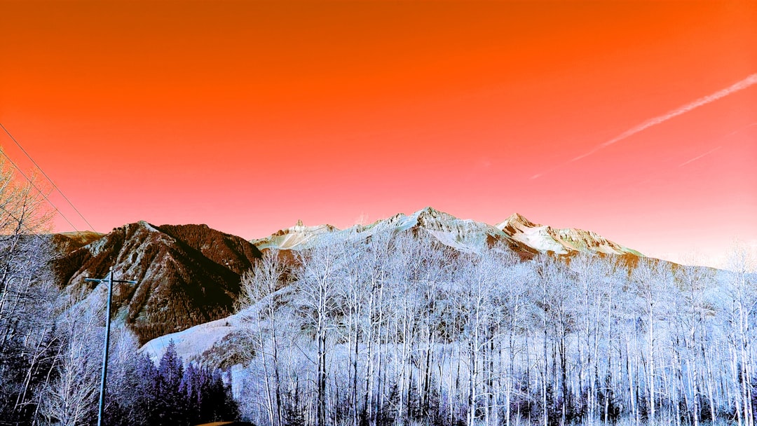 snow covered mountain during daytime