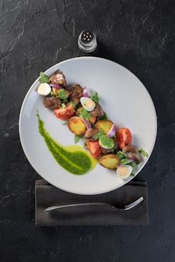 sliced fruits on white ceramic plate