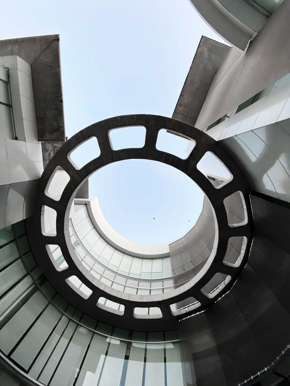 black metal round frame under blue sky during daytime