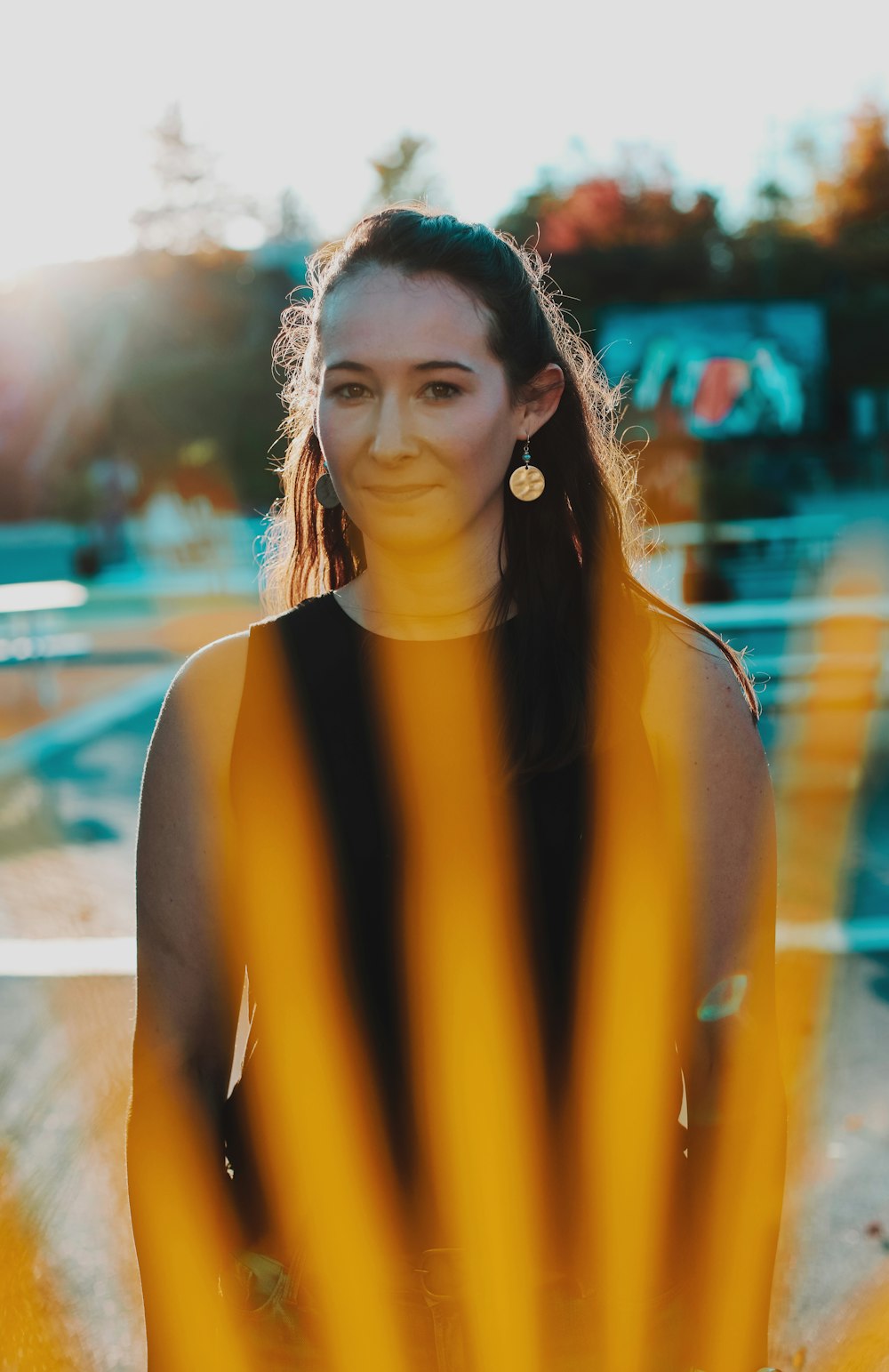 woman in yellow sleeveless dress