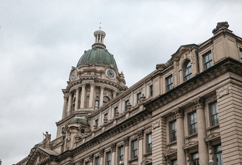 brown concrete building under white sky during daytime