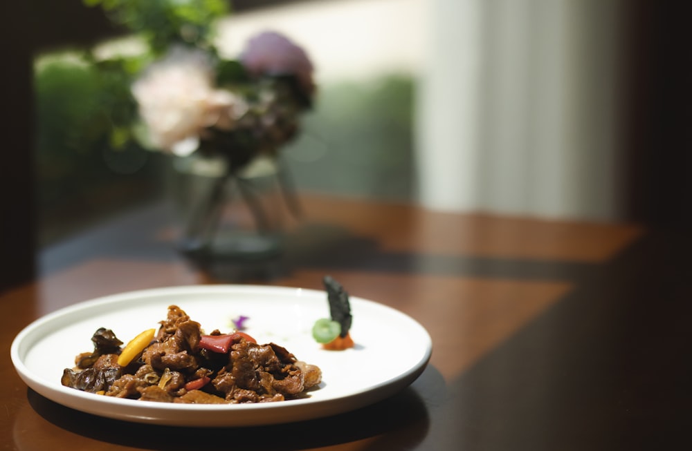 cooked food on white ceramic plate