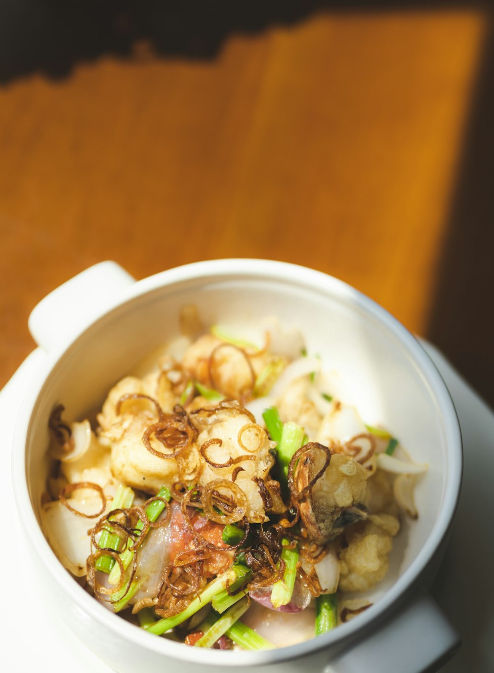 white ceramic bowl with soup