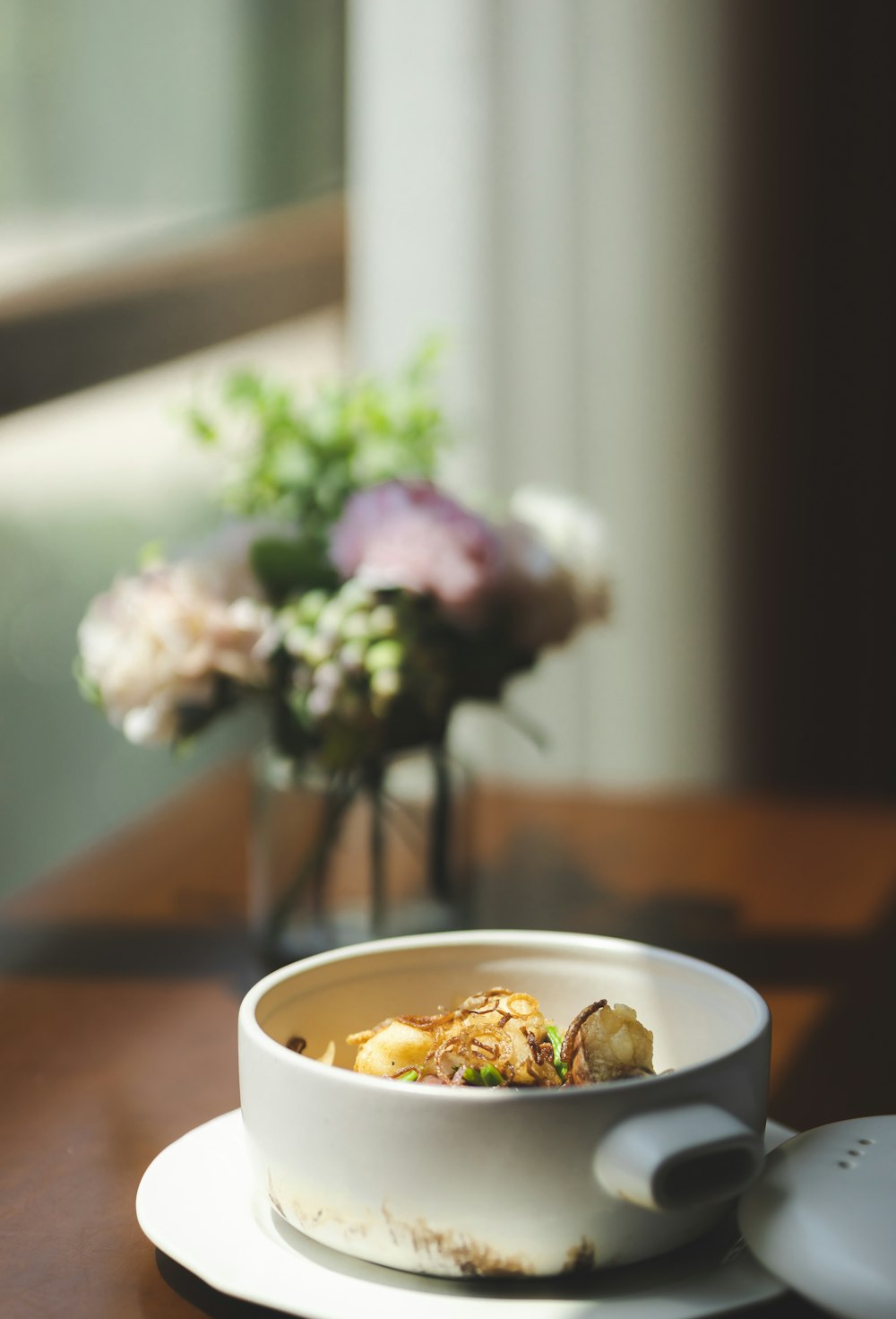 white ceramic bowl with food