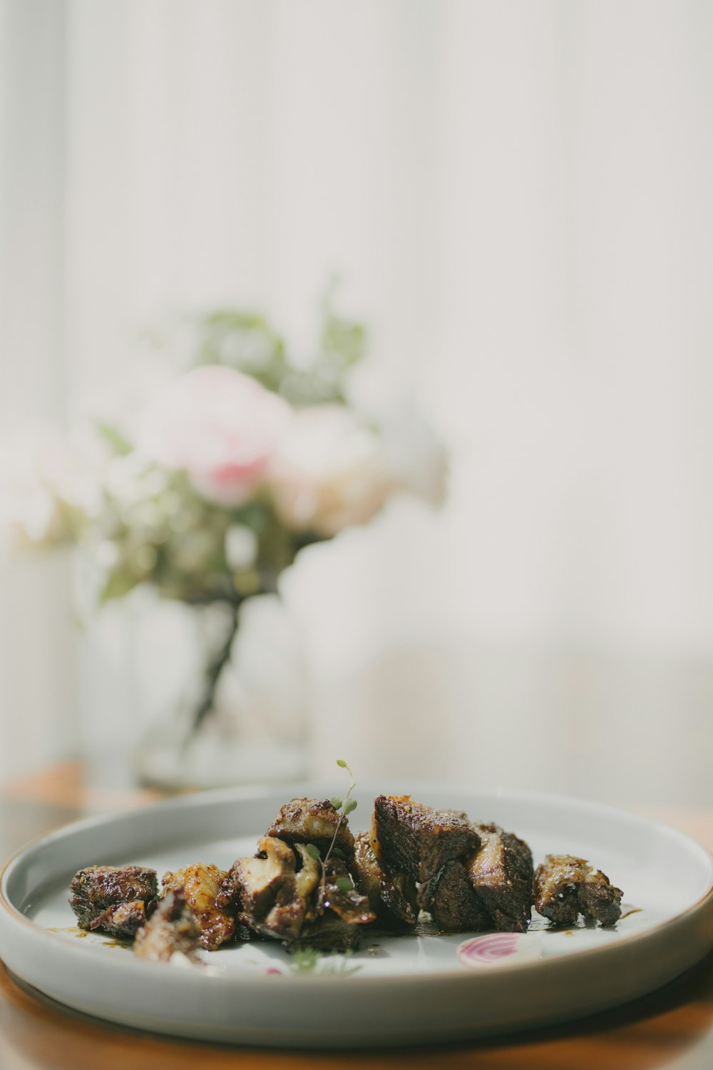 brown and white food on white ceramic plate