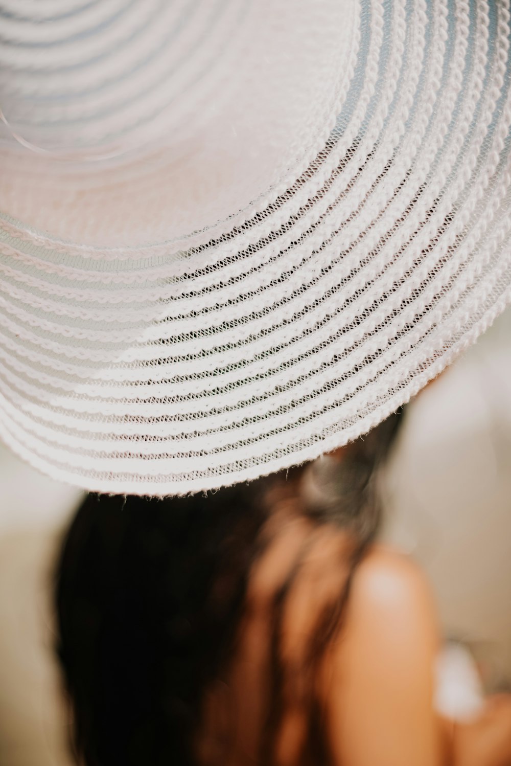 person wearing white knit cap