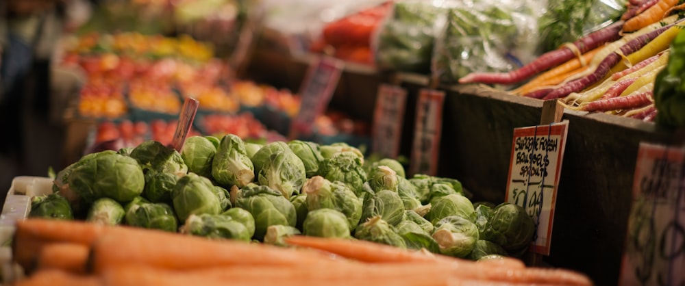 green vegetables on brown wooden table