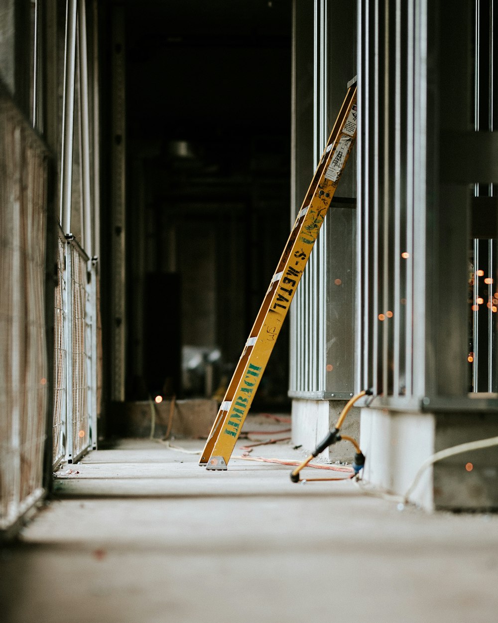 yellow and black metal ladder