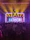 Crowd enjoying a live concert with vibrant digital signage created by Yellow Paint Media.