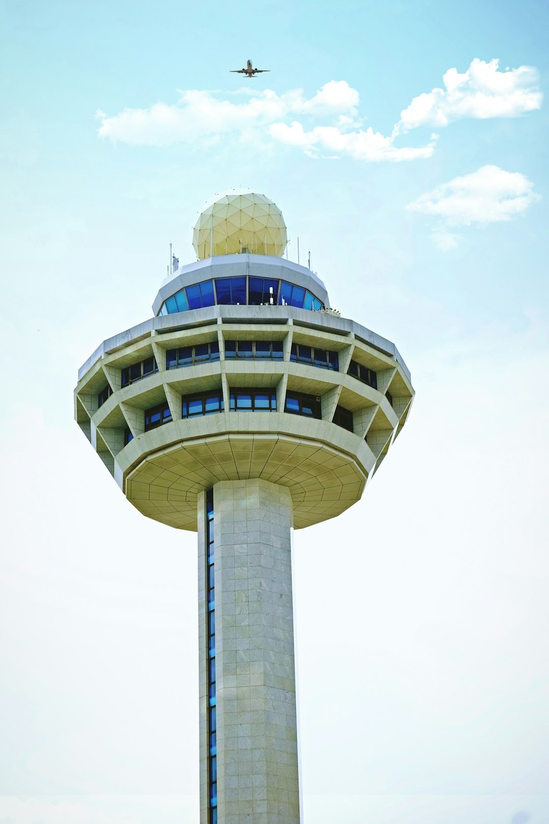 white and blue concrete building under blue sky during daytime