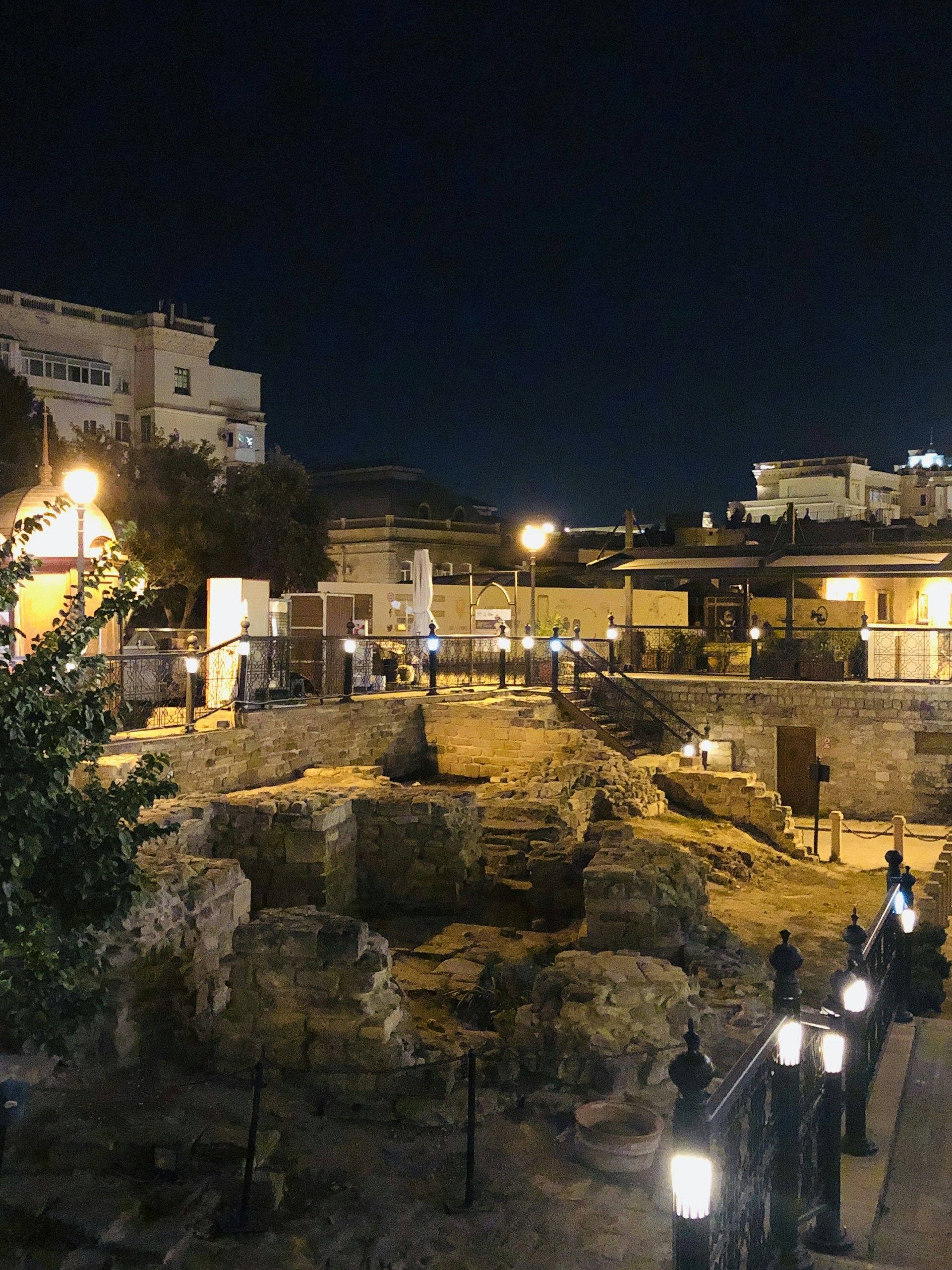 woman wearing yellow long-sleeved dress under white clouds and blue sky during daytime