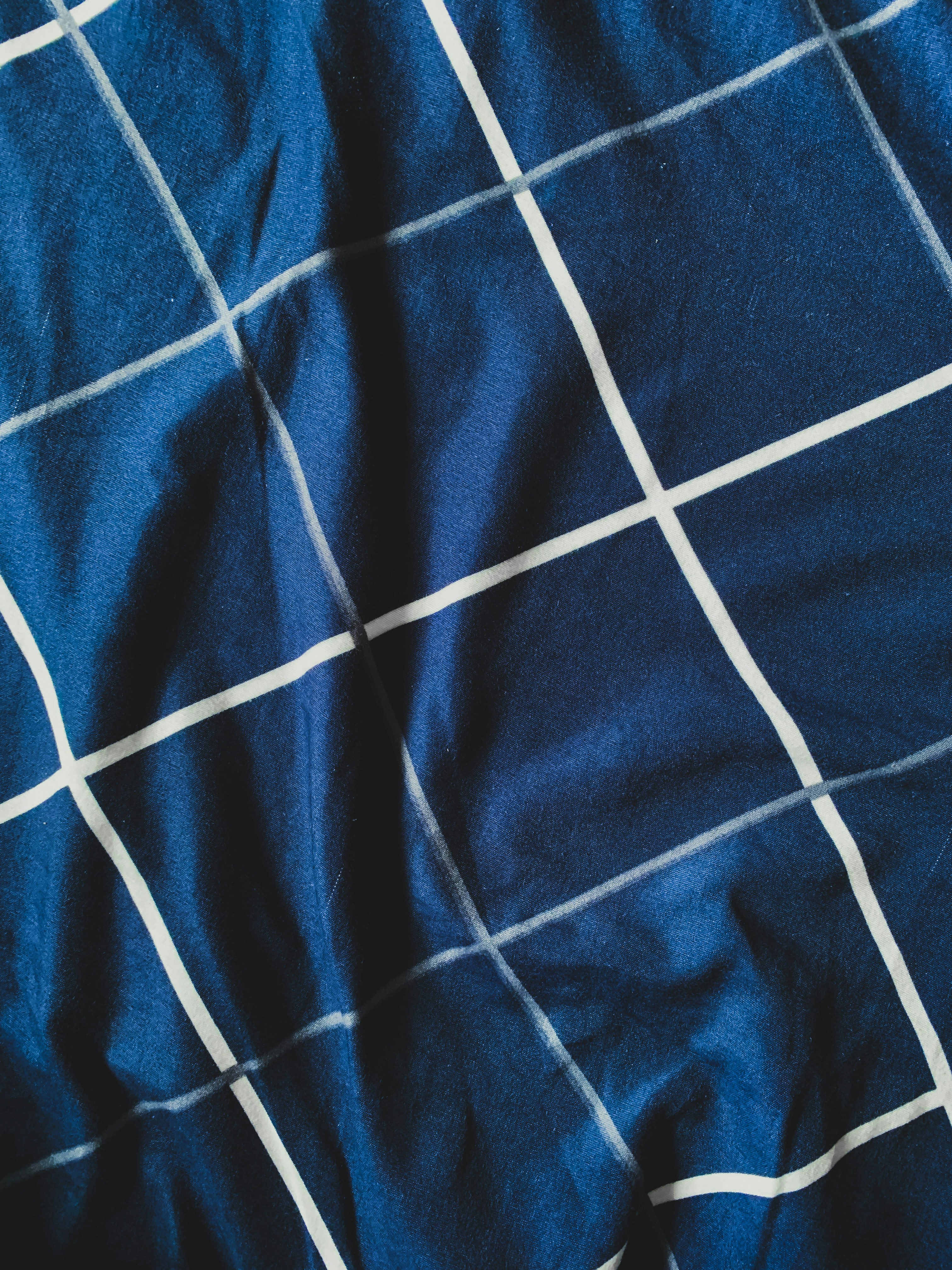 blue and white stripe textile