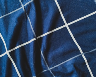 blue and white stripe textile