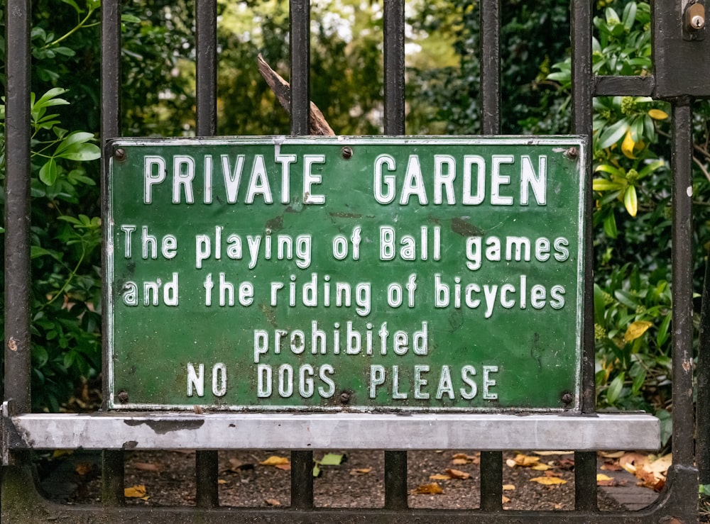 green and white wooden signage