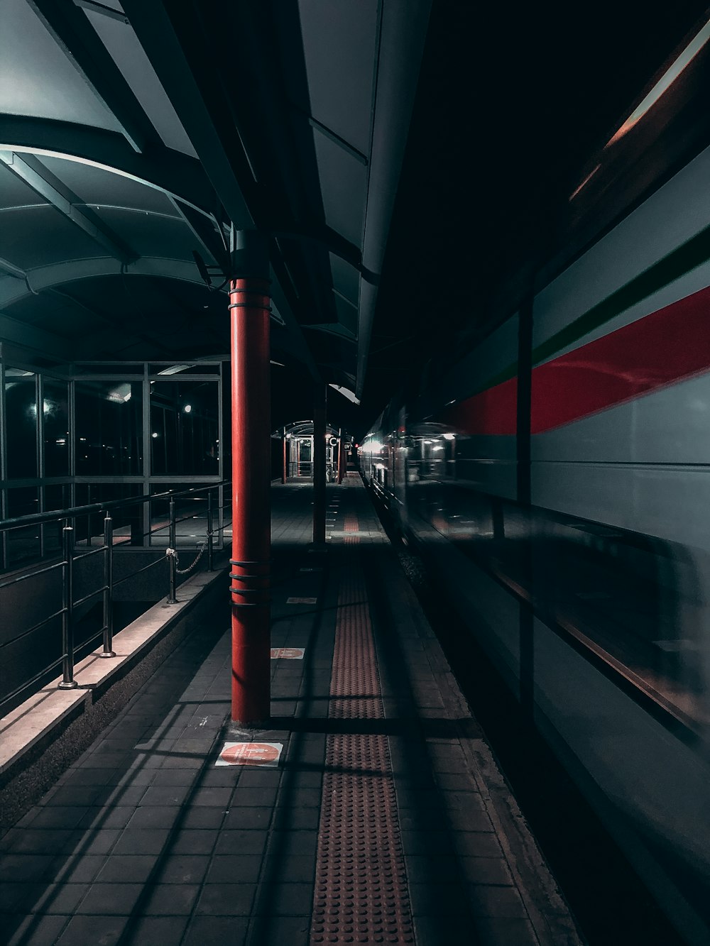 red and white train station