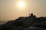 A breathtaking view of a Greek island at sunset.