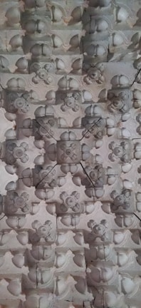 A subtle shot of a geometric pattern carved into stone, hinting at timeless craftsmanship.