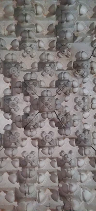 An intricate glyph motif carved into the deep blue stone walls of Shaedogath.