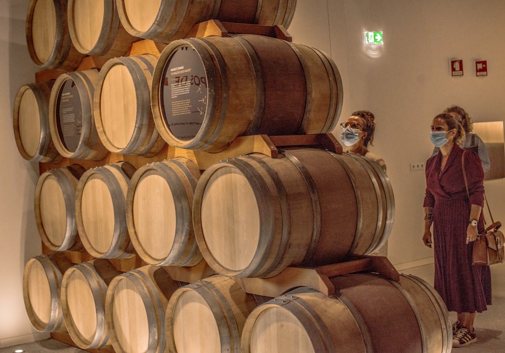 brown wooden barrels on brown wooden barrels