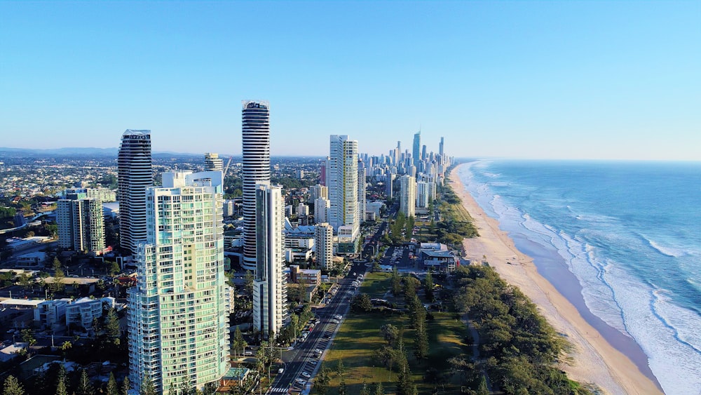 high rise buildings near sea during daytime