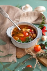 stainless steel spoon on white ceramic bowl