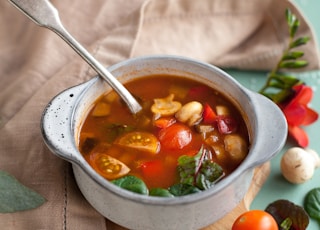 stainless steel spoon on white ceramic bowl