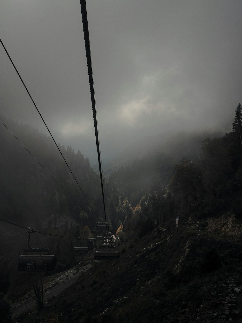 cable cars on foggy weather