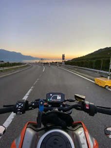 A scenic shot of Chiang Rai roads perfect for motorcycle rides at sunset.