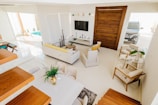 white and brown wooden table with chairs