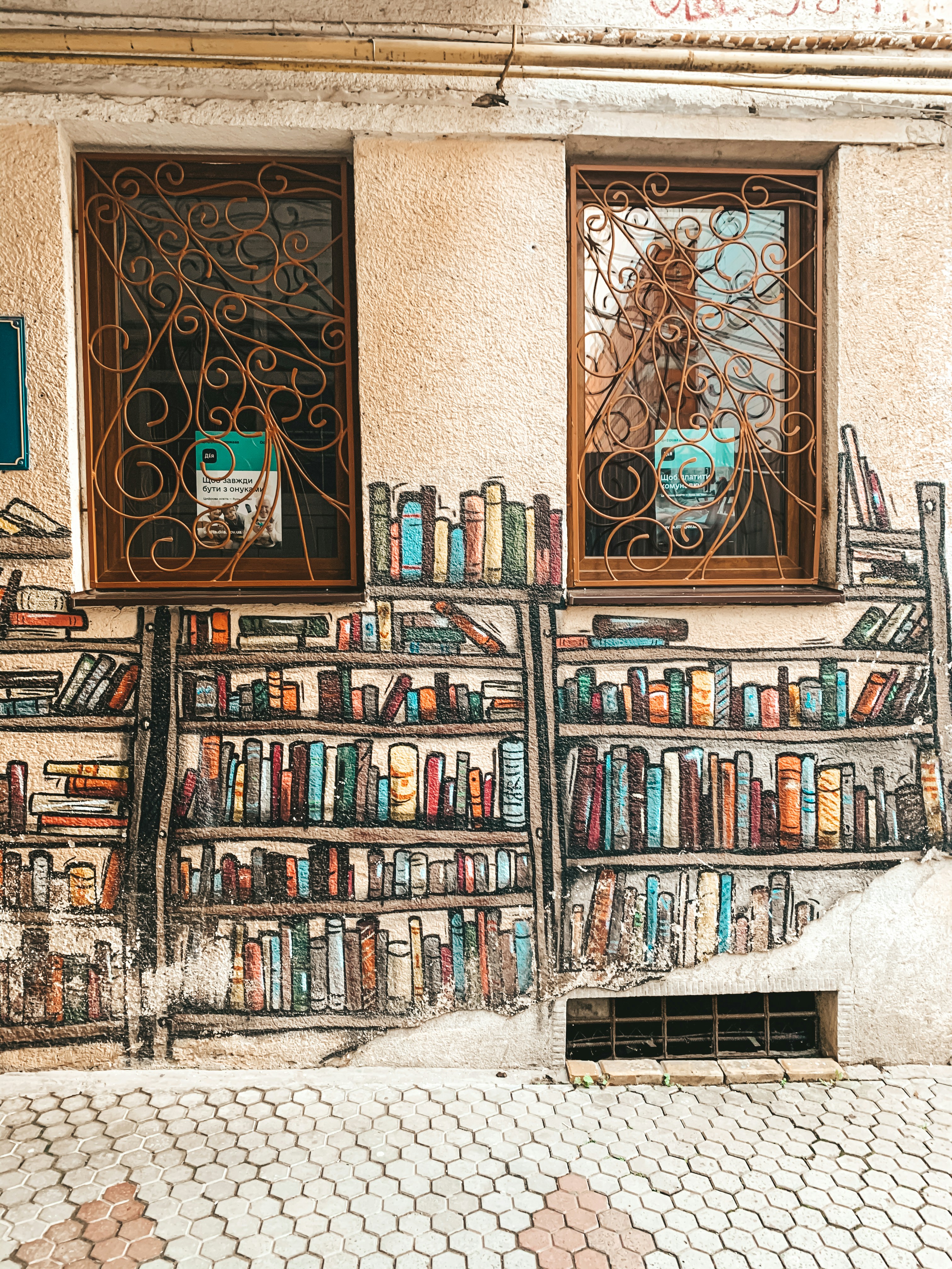 brown wooden book shelf with books